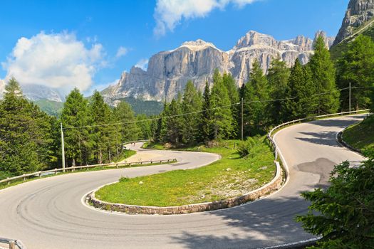 Dolomiti. winding road from Canazei to Pordoi pass, Trentino, Italy