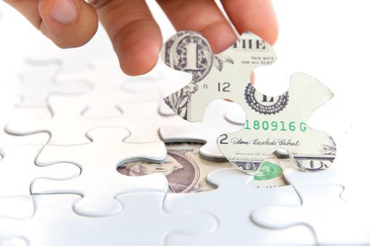 hand holding a puzzle piece, Finance concept