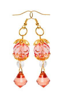 Earrings in red faceted glass with gold elements isolated on a white background. Collage. 