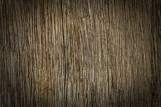 Close up of  A dark grungy wooden background