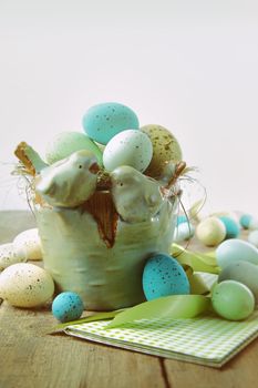 Speckled eggs  in bowl for Easter with vintage look