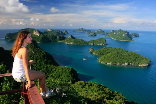 Young woman sitting at the view point, Wua Talab island, Ang Thong National Marine Park, Thailand