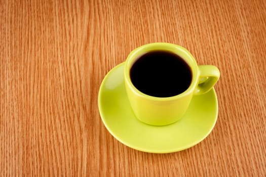 Coffee cup on wooden table