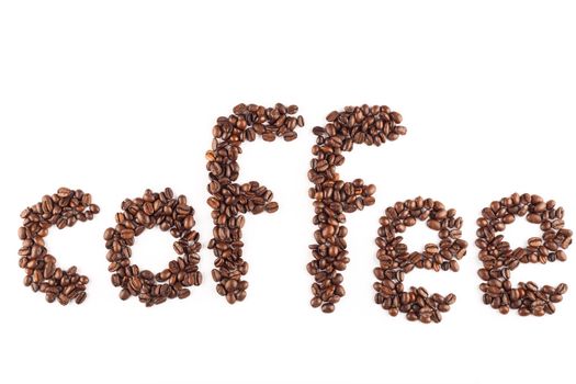 Coffee beans arranged in the word coffe.