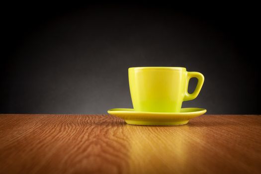 Coffee cup on wooden table