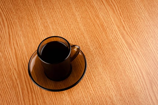 Coffee cup on wooden table