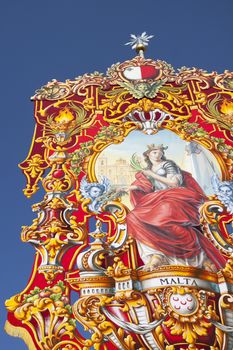 Festa in Malta Colourful street decorations, heraldic banners, gonfalon, for a feast for one of the many patron saints