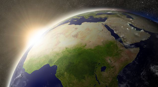 Sunset over North Africa region on planet Earth viewed from space with Sun and stars in the background. Elements of this image furnished by NASA.