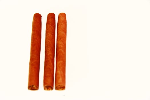 Natural cigarillo isolated on the white background