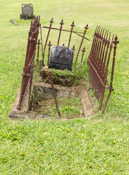 Old abandoned graves in cemetery at Mission church in Hanalei Kauai