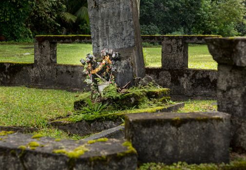 Old abandoned graves in cemetery at Mission church in Hanalei Kauai