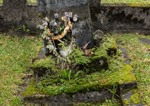 Old abandoned graves in cemetery at Mission church in Hanalei Kauai