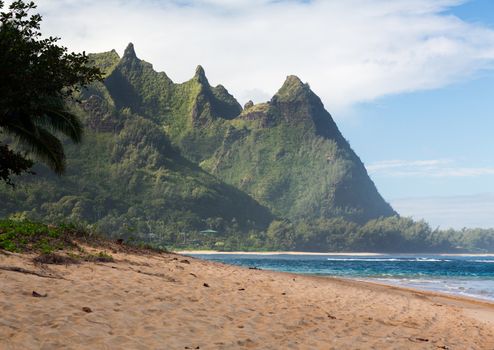 View down the sand at Tunnels Beach in winter on Hawaiian island of Kauai on North Shore