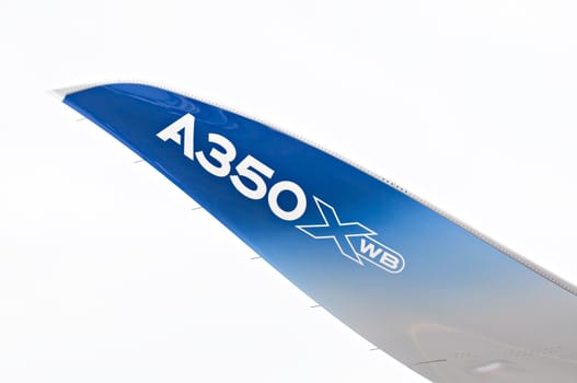 SINGAPORE - FEBRUARY 11: Winglet of Airbus A350 XWB prototype 003 at Singapore Airshow, Changi Exhibition Centre in Singapore on February 11, 2014.