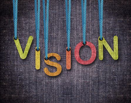 Vision Letters hanging strings with blue sackcloth background.