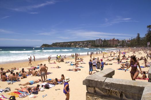 MANLY, AUSTALIA-DECEMBER 08 2013: Manly beach on busy, sunny day. The beach was declared the "Manly-Freshwater World Sufing Reserve in March 2012.