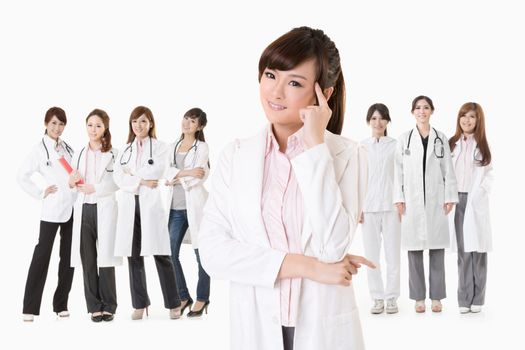 Asian doctor woman stand in front of her team and thinking, closeup portrait on white background.