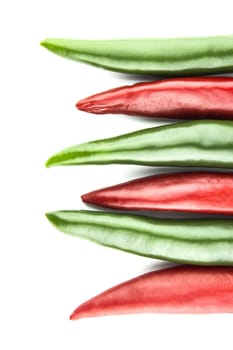 red and green hot chili pepper on a white background