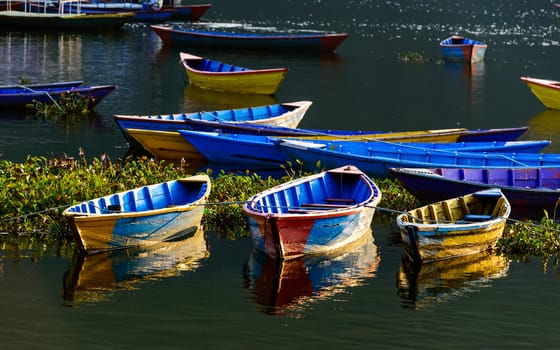 Colorful barques on Fewa Lake in Pokhara, Nepal