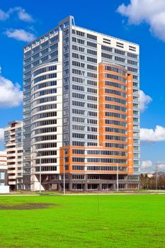 Beautiful view of modern apartment buildings under blue sky