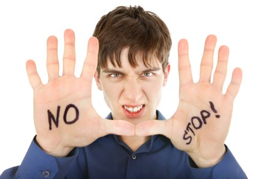 Teenager shows the palm gesture with an inscription No and Stop. Isolated on the White
