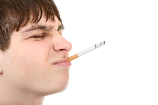 Side view of Teenage Face with cigarette on the White Background