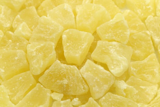 Dried pineapple dices close-up