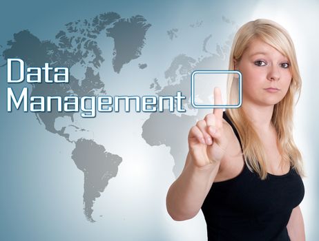 Young woman press digital Data Management button on interface in front of her