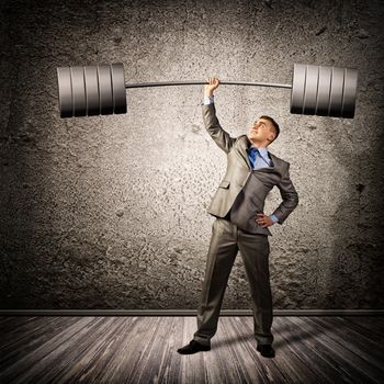 businessman holding a barbell with one hand, the concept of achievements in business