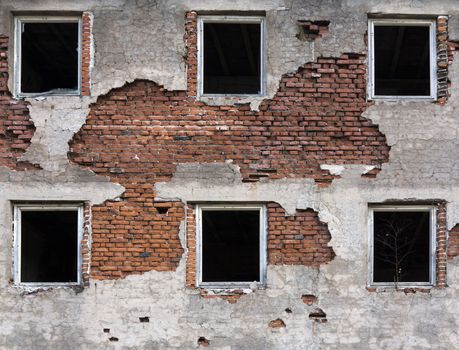 Shot of the old house with broken windows