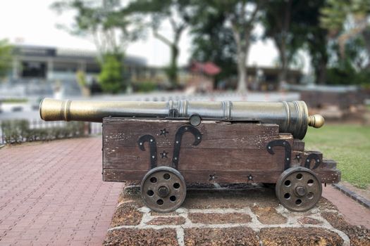 Medieval brass cannon isolated on white with clipping path