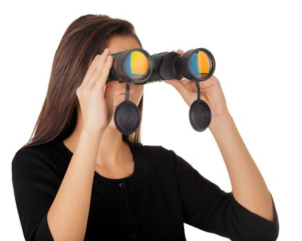 Beautiful girl looking through a pair of binoculars.