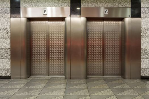 Two elevators with metal doors - For photography location background