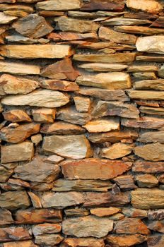 A close up shot of a stone feature wall