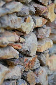 A close up shot of a stone feature wall