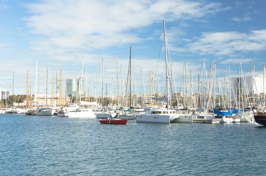 BARCELONA, SPAIN - DEC 28: Yacht boats at the dock port vell Barcelona, ​​Spain on December 28, 2013