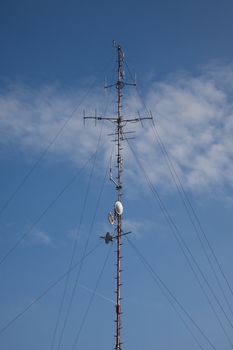 Antennas on a metal mast