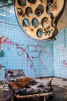 dirty operating room in an abandoned hospital