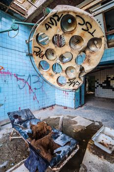 dirty operating room in an abandoned hospital