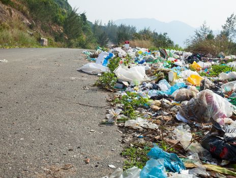 Spontaneous garbage dump along the road in Vietnam
