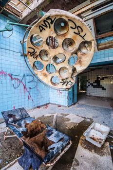 dirty operating room in an abandoned hospital