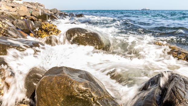 The beautiful waters of the Atlantic ocean with its rocky coastline near the City of Dakar in Senegal