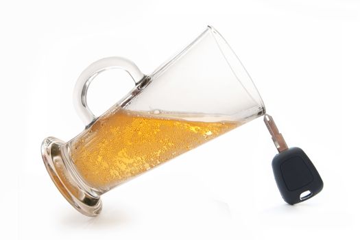 Beer glass balanced on top of car keys 