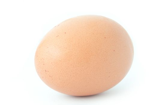 Single egg over a white background 