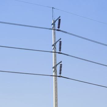 Electricity post on blue sky