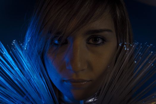 Virtual.Fiber Optic concept, woman with modern lights