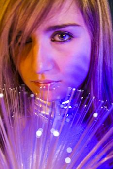 Inspiration.Fiber Optic concept, woman with modern lights