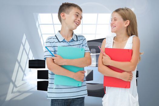 Smiling brother and sister holding their exercise books against room with holographic cloud