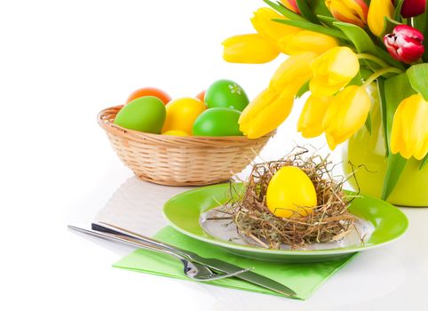 Easter eggs in a plate, on a white background