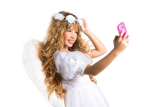 Angel blond girl taking picture mobile smartphone and feather wings on white byod to heaven